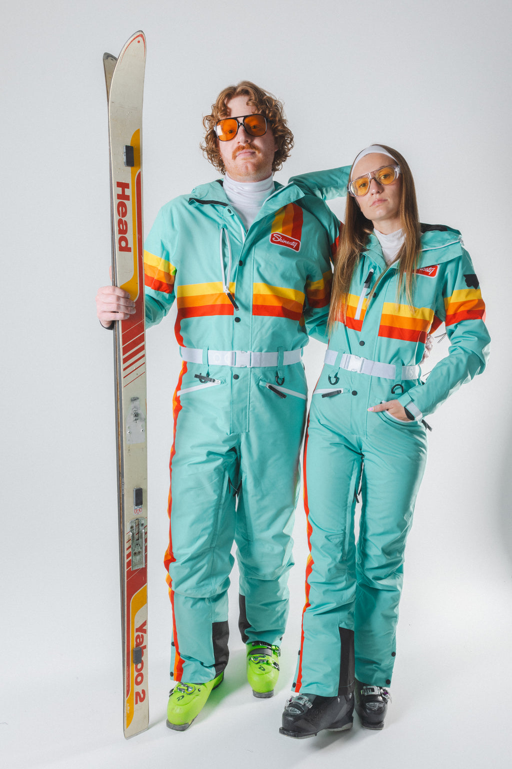The Midday Aprés | Teal and Orange Retro Stripe Women's One Piece Ski Suit - Shinesty