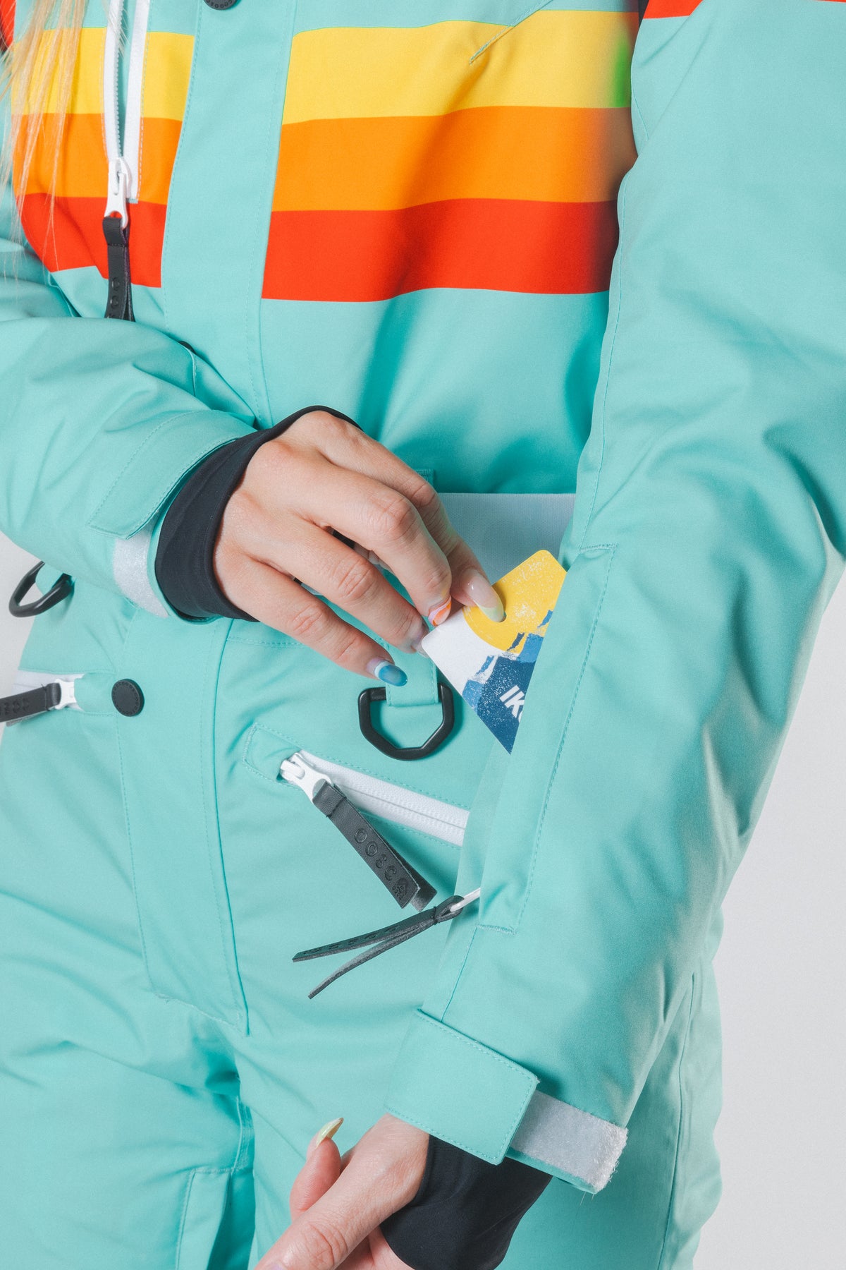 The Midday Aprés | Teal and Orange Retro Stripe Women's One Piece Ski Suit - Shinesty